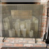 D20. Contemporary fire screen (33”h x 39”w) and iron fireplace tools. 